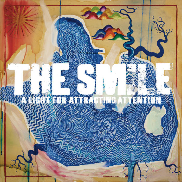 imagen del disco A Light for Attracting Attention de The Smile en donde se ve una portada hecha de un lienzo de pintura con temática más conceptual, donde se ve lo que interpreto como un lago con distintas ramificaciones de rios, un sol a la esquina y montañas en la parte superior